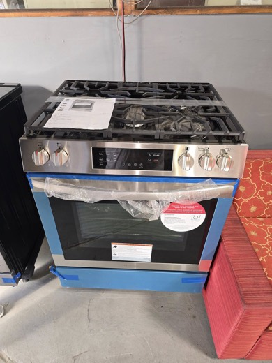 New stainless steel gas range