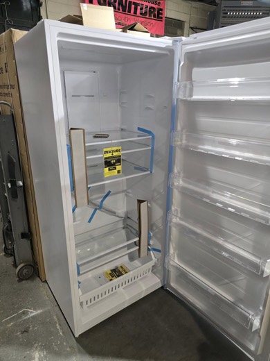 White upright freezer, interior view