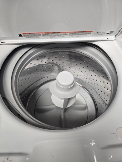 Top-load washer with clean stainless drum