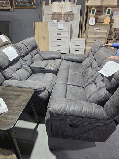 Gray reclining sofa and loveseat set