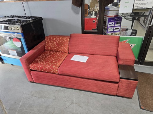 Retro red sofa with built-in end table