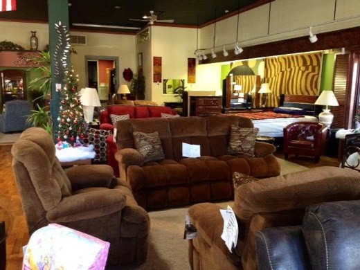 Brown recliner sofa set in showroom