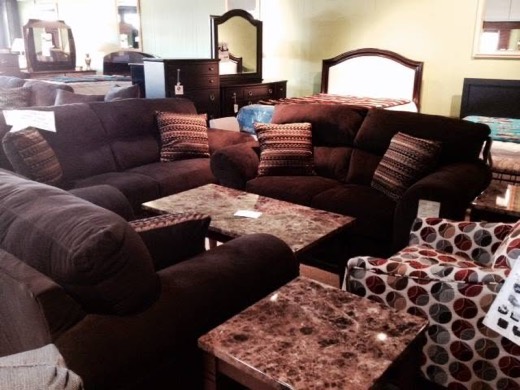 Brown sofa set with accent pillows