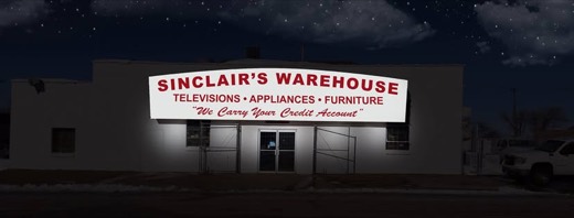 Sinclair's Warehouse storefront at night